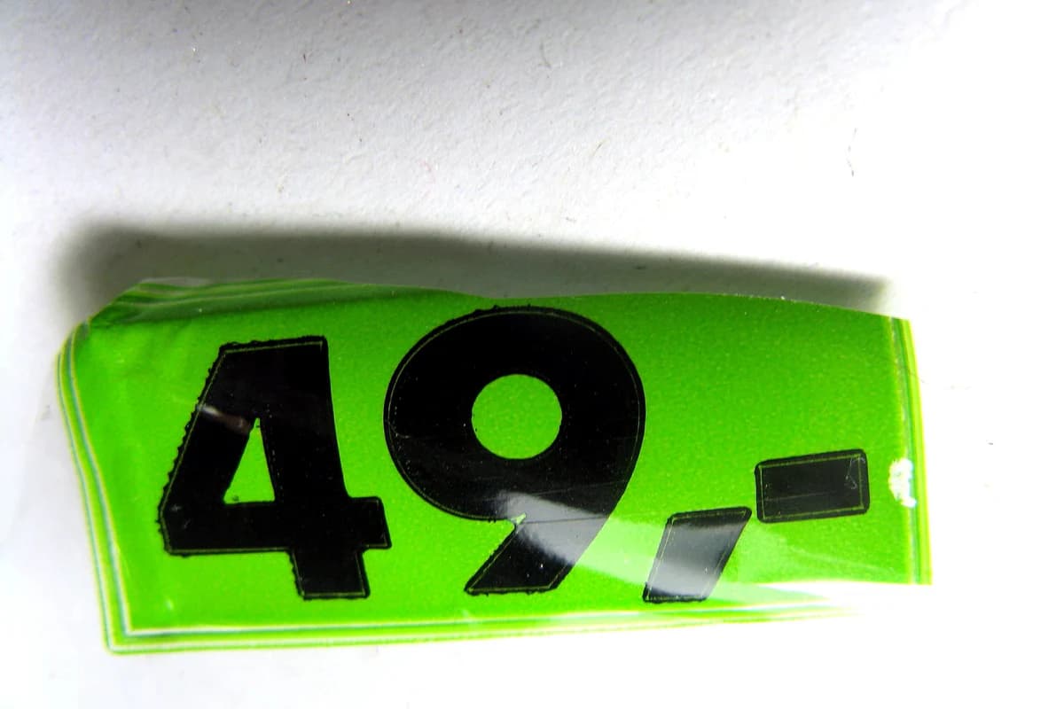 Real green price sign reading 49 before the demonstration edit